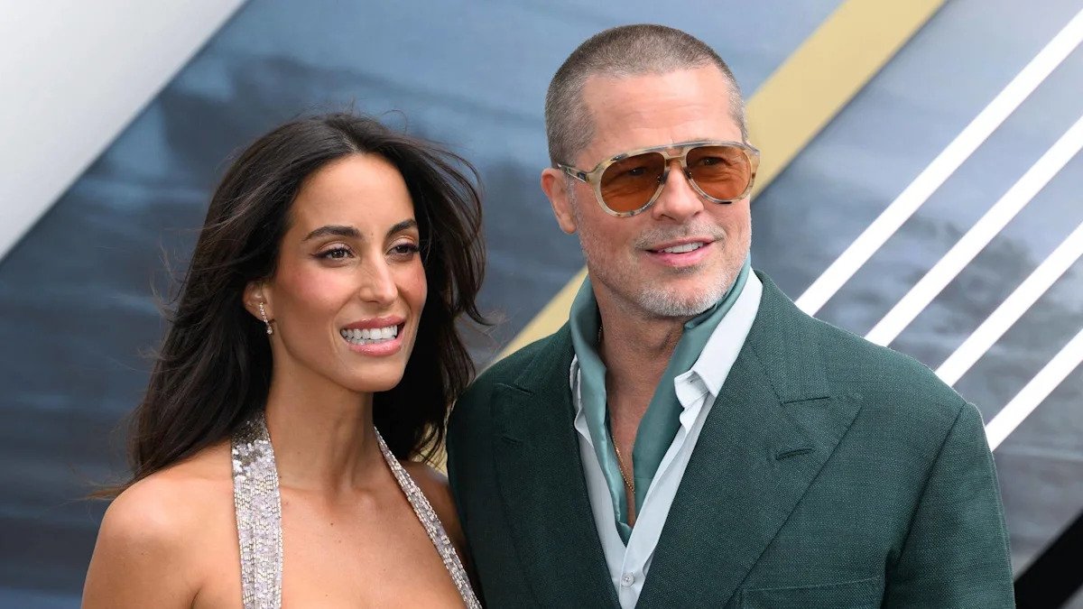 Brad pitt spotted with girlfriend at french open
